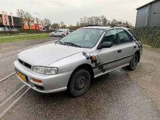 Damaged car Subaru Impreza 1.6i GL AWD 16V Hatchback 4Dr Benzine 1.597cc 70kW (95pk) 4x4 1998-06/2000-12 (GF4) EJ161 1999/1