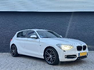 Damaged car BMW 1-serie 116i Sport Line Automaat 2014/1