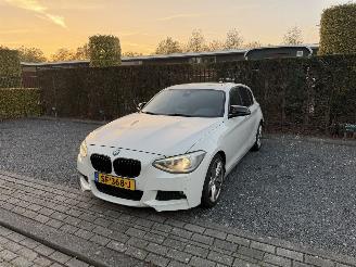 Damaged car BMW 1-serie 116i Pano 2011/12