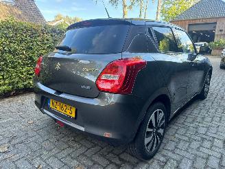 Damaged car Suzuki Swift 1.2 STIJL SMART HYBRID NAVI CAMERA CRUISE STOELVERWARMING 2017/5