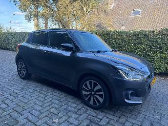 Auto incidentate Suzuki Swift 1.2 STIJL SMART HYBRID NAVI CAMERA CRUISE STOELVERWARMING 2017/5