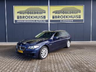 Vaurioauto  passenger cars BMW 5-serie Touring 520i Executive 2015/5