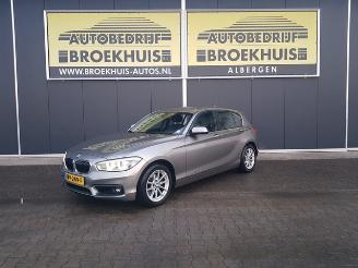skadebil auto BMW 1-serie 120i High Executive 2017/4