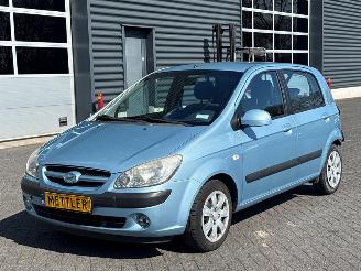 uszkodzony samochody osobowe Hyundai Getz 1.4i 16V Hatchback  Benzine 1.399cc 71kW (97pk) FWD 2007/2