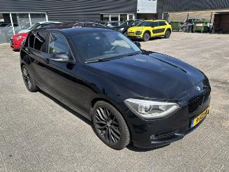 Damaged car BMW 1-serie 116i  5-drs  High Exe. 2013/12