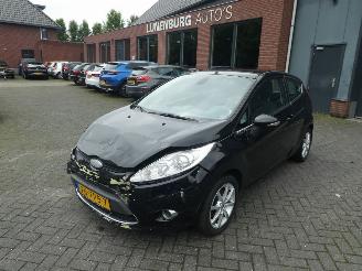 Damaged car Ford Fiesta 1.4 Ghia Airco 2009/9