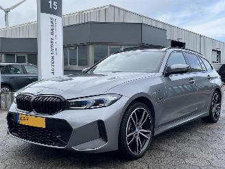 krockskadad bil auto BMW 3-serie Touring 330e xDrive 2023/2