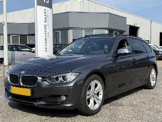 damaged passenger cars BMW 3-serie Touring 320d High Executive AUTOMAAT 2013/1