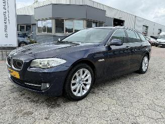 Schadeauto BMW 5-serie Touring 523i High Executive 2021/8