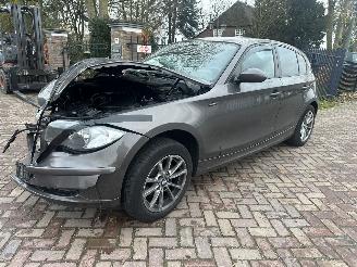 krockskadad bil auto BMW 1-serie 116i 2009/8