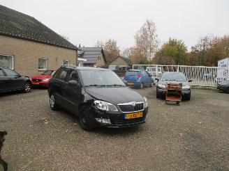 damaged passenger cars Skoda Fabia 1.2 TSI Ambition Combi NAP 2011/5