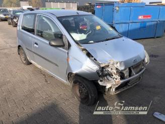 Daihatsu Cuore Cuore (L251/271/276), Hatchback, 2003 1.0 12V DVVT picture 2