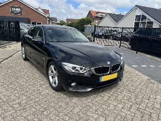 Schadeauto BMW 4-serie 418i Centennial High Executive | 98.308 km!! 2017/2