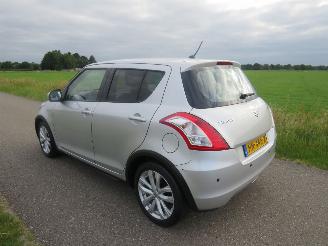 damaged passenger cars Suzuki Swift 1.2 94pk  Automaat 5Drs 68.000km Nap Airco Exclusief  2015-12 2015/12