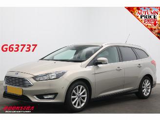 begagnad bil auto Ford Focus 1.0 Titanium Edition Cruise Navi Clima SHZ PDC AHK 2015/1