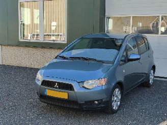 Vaurioauto  passenger cars Mitsubishi Colt 1.3 Edition Airco Cruise Tr.haak 2012/2