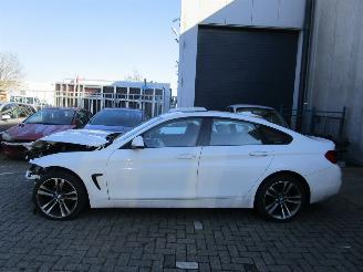 damaged passenger cars BMW 4-serie 418i Gran Coupe Sport Line Automaat 2019/1