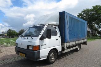 krockskadad bil bedrijf Mitsubishi L-300 2.5 TD LANG OPEN LAADBAK / PICK-UP MET HUIF EN N.A.P. MARGE AUTO 1997/3