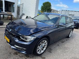 damaged passenger cars BMW 3-serie 320i AUTOMAAT Executive Sport 2013/5
