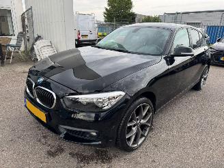 Damaged car BMW 1-serie 118i Essential 2015/9