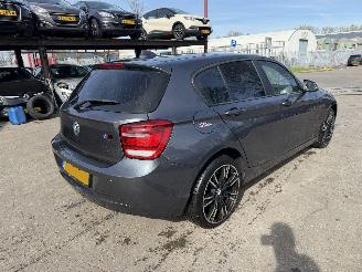 Voiture accidenté BMW 1-serie 116i Autom. 100KW Clima Navi 5-Drs 2012/2