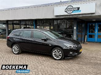 Vaurioauto  passenger cars Opel Astra Sports Tourer 1.0 Edition Automaat Navigatie Clima Cruise PDC 2016/7