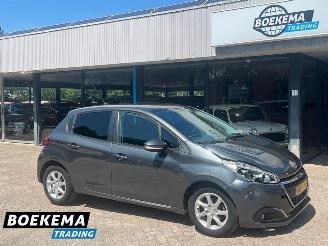skadebil auto Peugeot 208 1.2 PureTech Allure Navigatie Airco Cruise PDC 2016/2