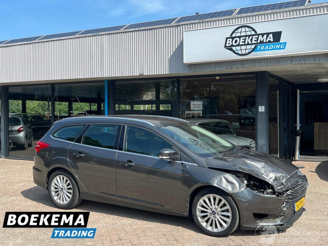 Ford Focus Wagon 1.5 TDCI Titanium Navigatie Climate Cruise PDC Trekh.