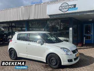Damaged car Suzuki Swift 1.3 Shogun Airco Cruise 2009/1