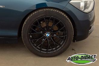 BMW 1-serie 114i Navi Airco Stoelverwarming Leder Upgrade Edition picture 30