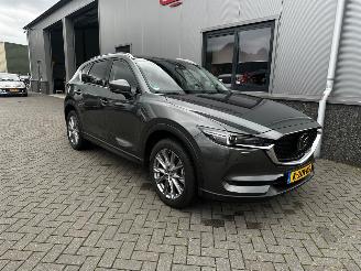 Vaurioauto  passenger cars Mazda CX-5 2.0 SkyActiv-G 165 Luxury Automaat 2021/2