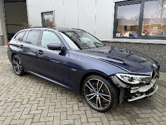 Schadeauto BMW 3-serie 330e High Executive 2022/2