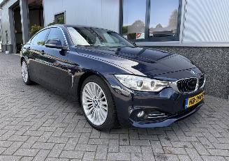 uszkodzony samochody osobowe BMW 4-serie 420i Luxury Gran Coupe 2015/10