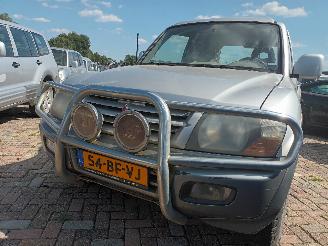 uszkodzony samochody osobowe Mitsubishi Pajero Pajero Canvas Top (V6/7) Terreinwagen 3.2 DI-D 16V (4M41) [118kW]  (10=
-2001/12-2006) 2002/10