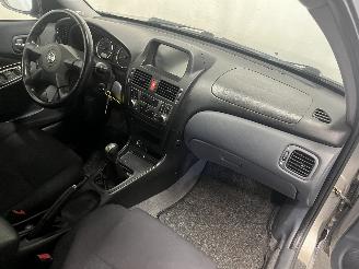 Nissan Almera Almera (N16) Hatchback 1.8 16V (QG18DE) [85kW]  (10-2002/11-2006) picture 8