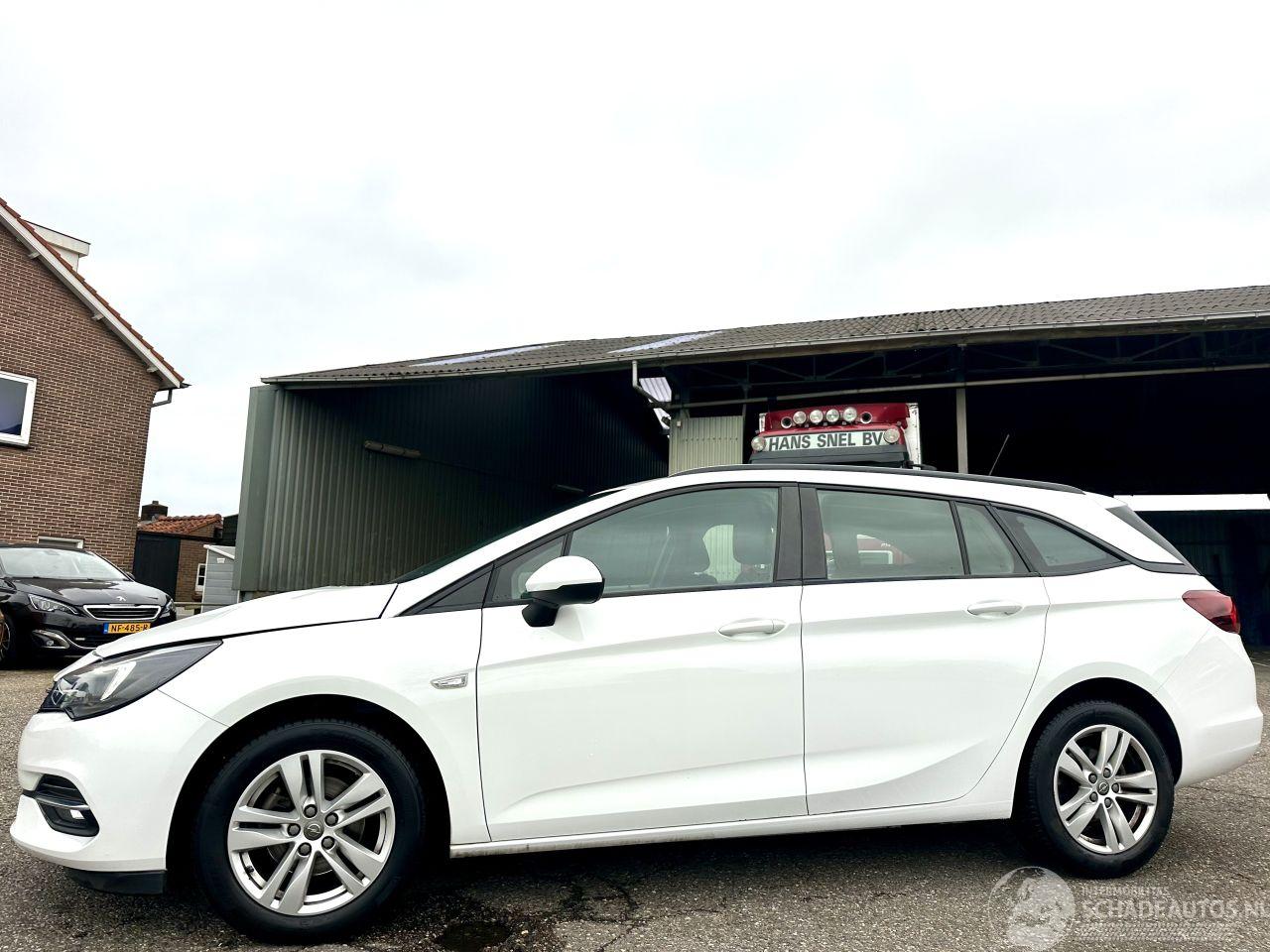 Opel Astra sports tourer 1.4 Turbo 145pk automaat - navi - nap - org NL - airco - cruise - pdc - licht + regensensor