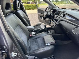 Mitsubishi Outlander 2.0 Turbo 201pk 4WD - uniek - 2x schuifdak - airco - leer + alcantara + stoelverw - privacy glass - rijdbaar picture 52