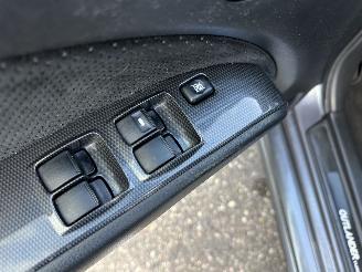 Mitsubishi Outlander 2.0 Turbo 201pk 4WD - uniek - 2x schuifdak - airco - leer + alcantara + stoelverw - privacy glass - rijdbaar picture 46