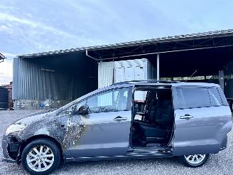 skadebil auto Mazda 5 1.8i 116pk Katano 7-Pers - nap - stoelverw - navi - touchscreen - clima - trekh - regensensor 2010/1