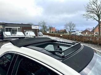 Opel Adam Cabrio 1.0 turbo 90pk 6-bak Rocks Online Ed - nap - clima - cruise - pdc v+a - 17 inch - side assist - elektr dak picture 7