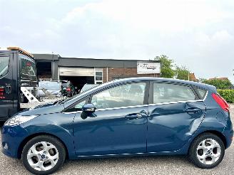 škoda osobní automobily Ford Fiesta Gereserveerd 1.25i 82pk Titanium 5drs - 94dkm nap - airco - cruise - licht + regensensor + aut dimmend binnenspiegel - lmv 2009/3
