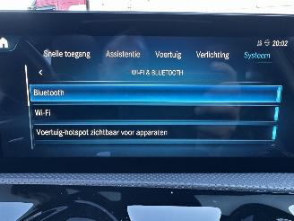 Mercedes A-klasse 250e aut + f1 AMG Bus Sol Limited - nap - pano - 1e eig - widescreen - sfeerverl - cam - front + line assist - keyless picture 27