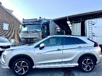 Vaurioauto  passenger cars Mitsubishi Eclipse Cross 2.4 PHEV Plug-In Hybr aut 4WD Exec - nap - 2023/3