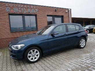 Damaged car BMW 1-serie 118i XENON AUTOMATISCHE AIRCO 2012/8