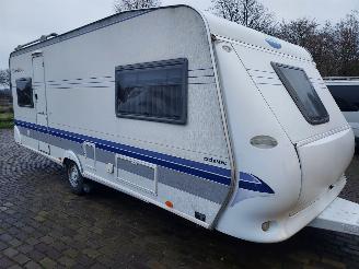 skadebil caravan Hobby  Exclusive 560 UL Enkele bedden+Mover+Voortent 2004/2