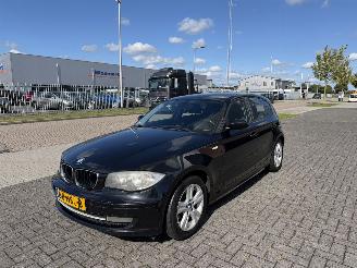 damaged passenger cars BMW 1-serie 118i 105kw 2009/2