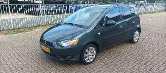 Tweedehands auto Mitsubishi Colt 1.3-16v Automaat 95pk Airco Lichtautomaat cruisecontrol Regensensor 4xElektrische ramen Elektrische-spiegels met verwarming Centrale vergrendeling met afstandsbediening Privacyglas leren stuurwiel mistlampen Metallic Lak Trekhaak 15-inch Velgen volledig O 2011/9