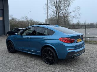 Voiture accidenté BMW X4 M40i 360Pk Centenial High Executive Schuifdak Harman Kardon Head-Up 2016/9