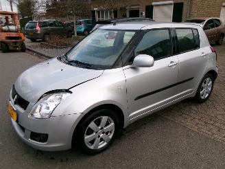 krockskadad bil auto Suzuki Swift 1.3 BANDIT CLIMA 5 DEURS 2009/9