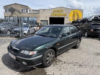 uszkodzony samochody osobowe Mazda 626 DOHC 1.9 - VALVE 2001/1